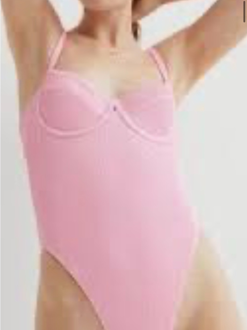 H&M Pink Ribbed One
Piece Swimsuit.